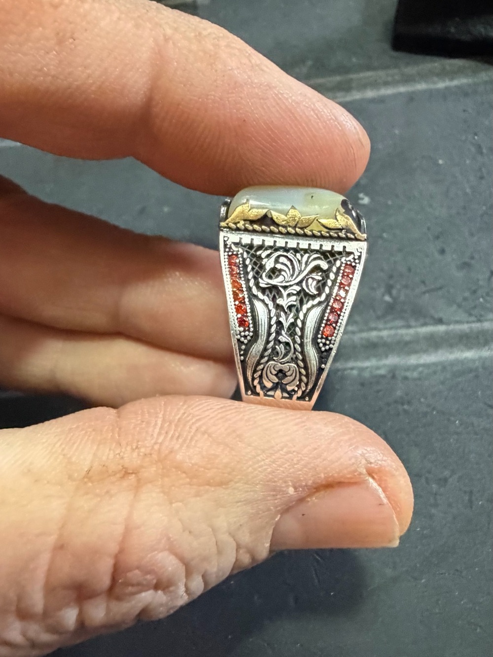 Intricate sterling Silver  Statement Ring with Green Stone and Red Accents